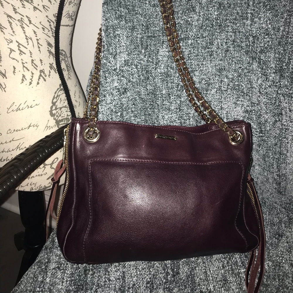 A gently used Rebecca Minkoff. Leather and chain.